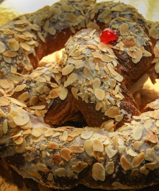 A Bretzel with a cherry in the middle