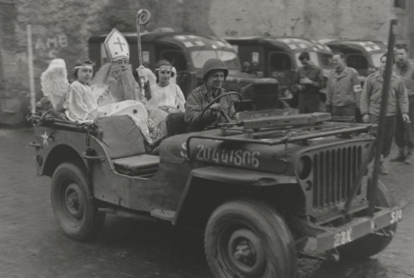 'Saint Nick' visits the children of Wiltz in his Jeep
