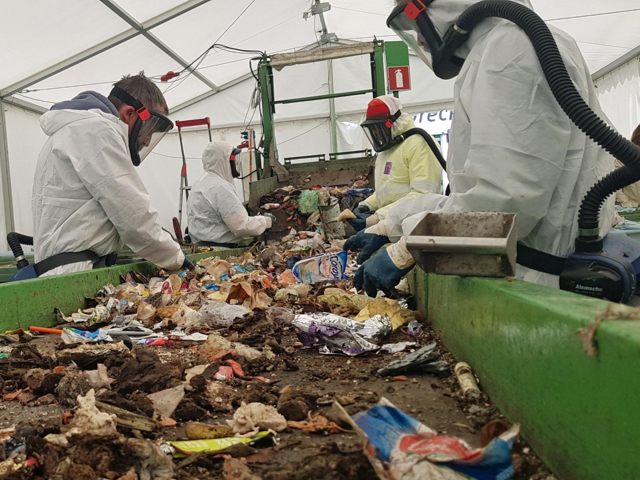 Workers sorting waste